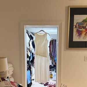 Elegant Cream Sleeveless Pleated Maxi Dress